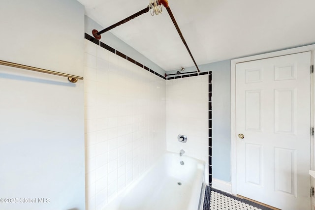 bathroom featuring  shower combination