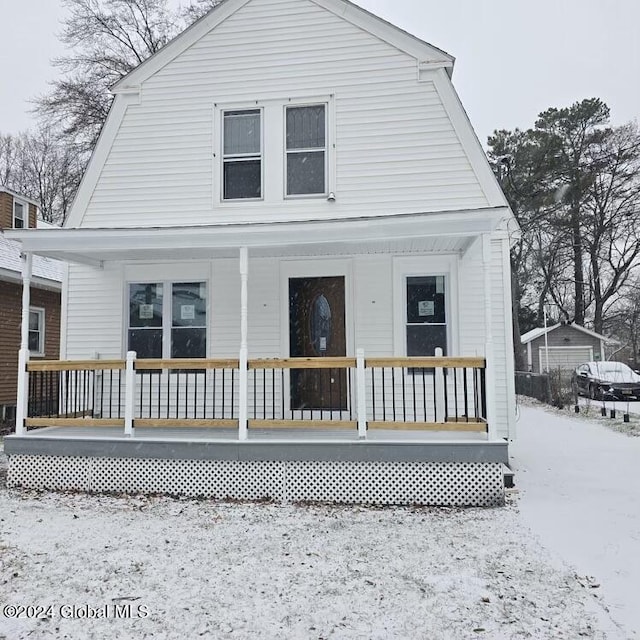 view of snow covered house