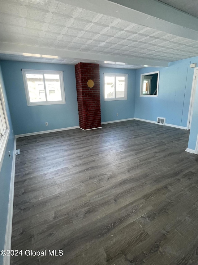 unfurnished room with dark hardwood / wood-style floors