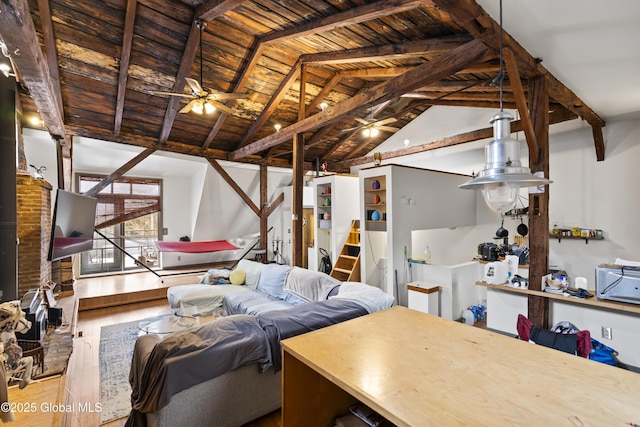 living room featuring ceiling fan, vaulted ceiling with beams, wood ceiling, and hardwood / wood-style floors