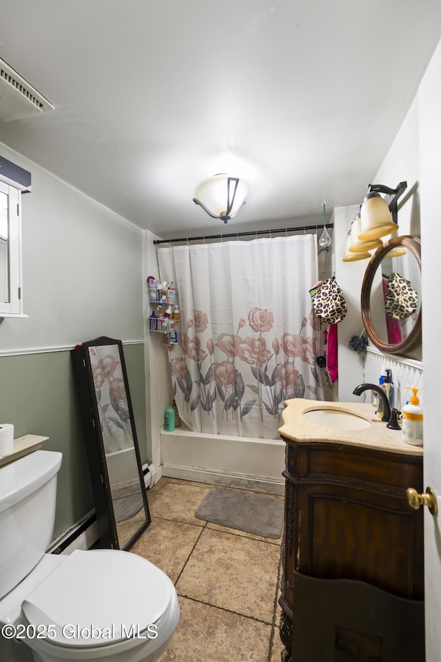 full bathroom with toilet, baseboard heating, shower / tub combo, and vanity