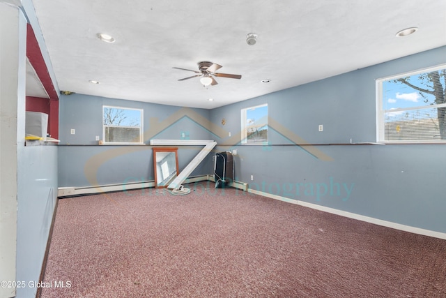 game room featuring carpet flooring, baseboard heating, and ceiling fan