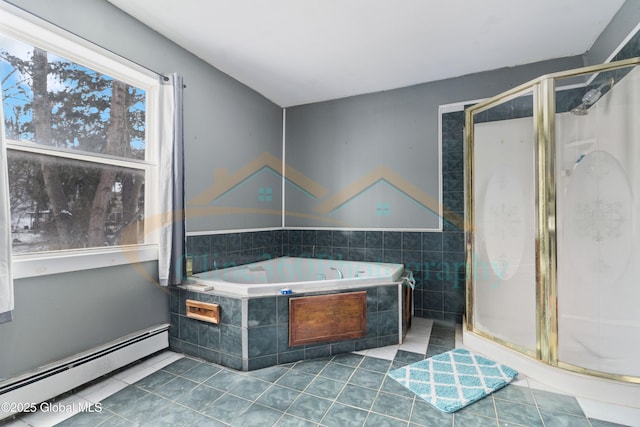 bathroom featuring tile patterned flooring, shower with separate bathtub, and a baseboard radiator