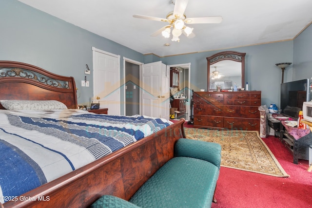 bedroom with ceiling fan and carpet