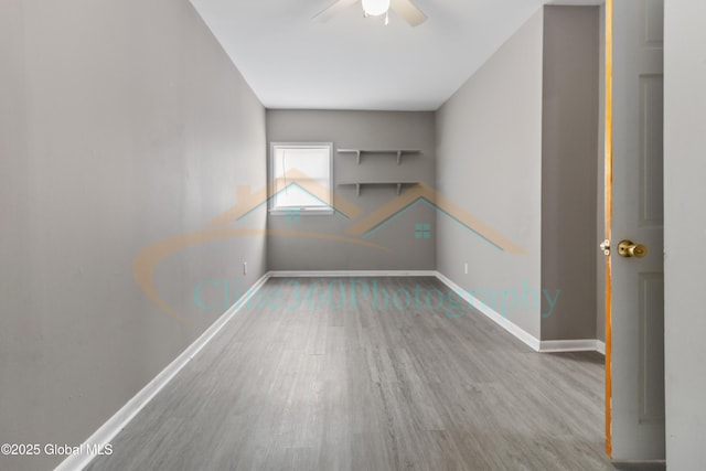 interior space featuring hardwood / wood-style flooring and ceiling fan