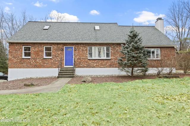 view of front of home with a front yard