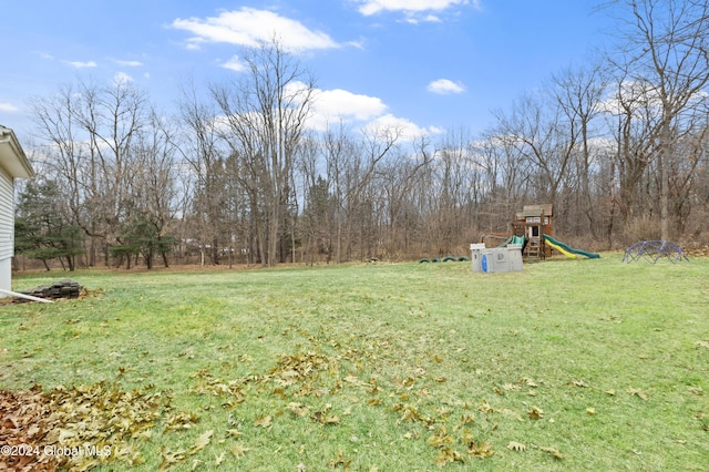 view of yard with a playground