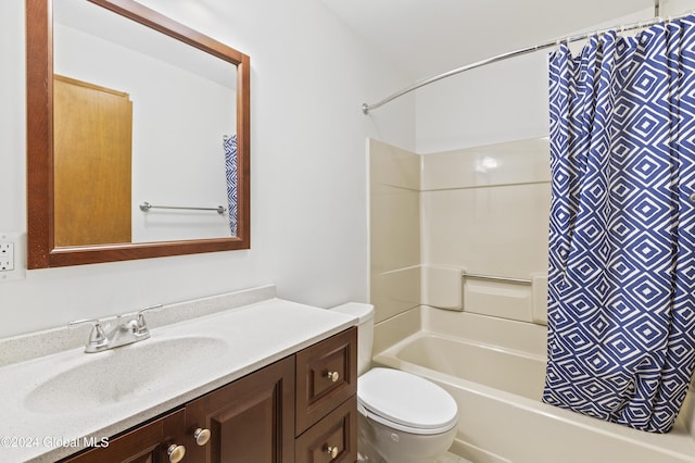 full bathroom featuring shower / bathtub combination with curtain, vanity, and toilet