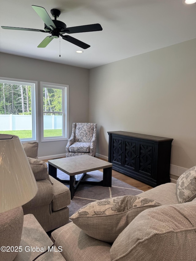 176 Butler Rd, Moreau, NY 12828 - living area featuring baseboards, wood finished floors, recessed lighting, and a ceiling fan