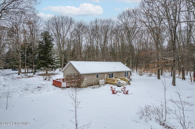 view of front of home featuring a wooden deck