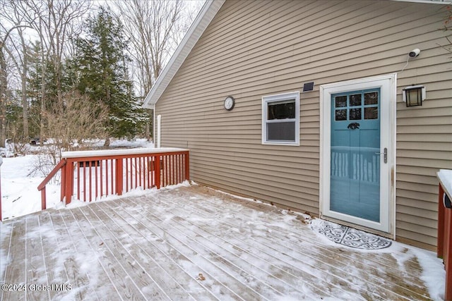 view of snow covered deck