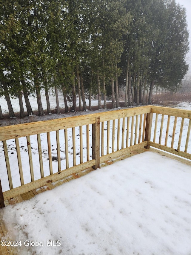 view of snow covered deck