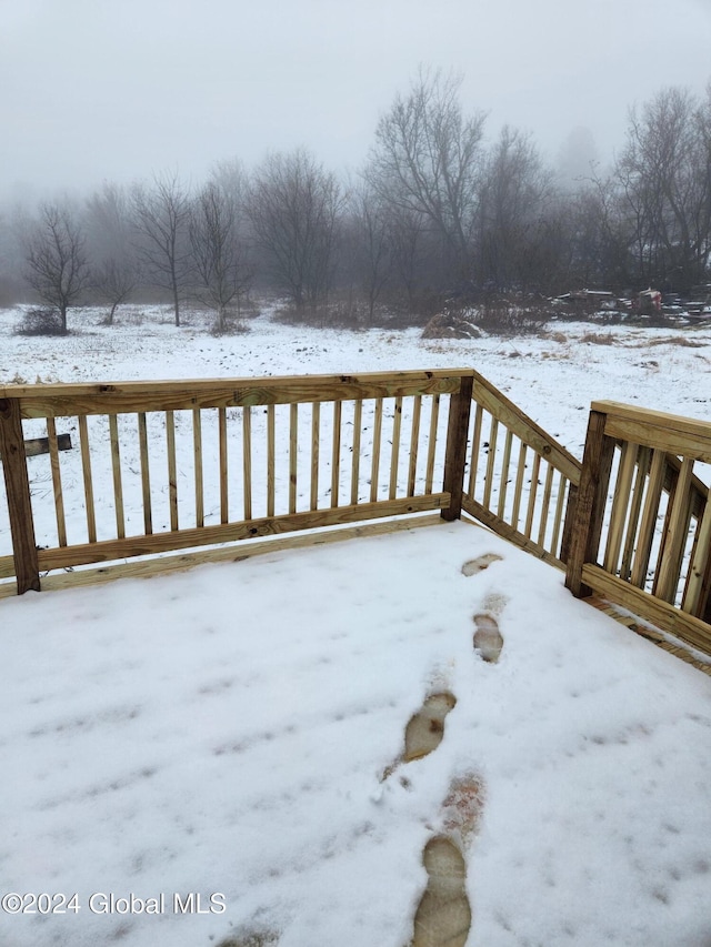 view of snow covered deck