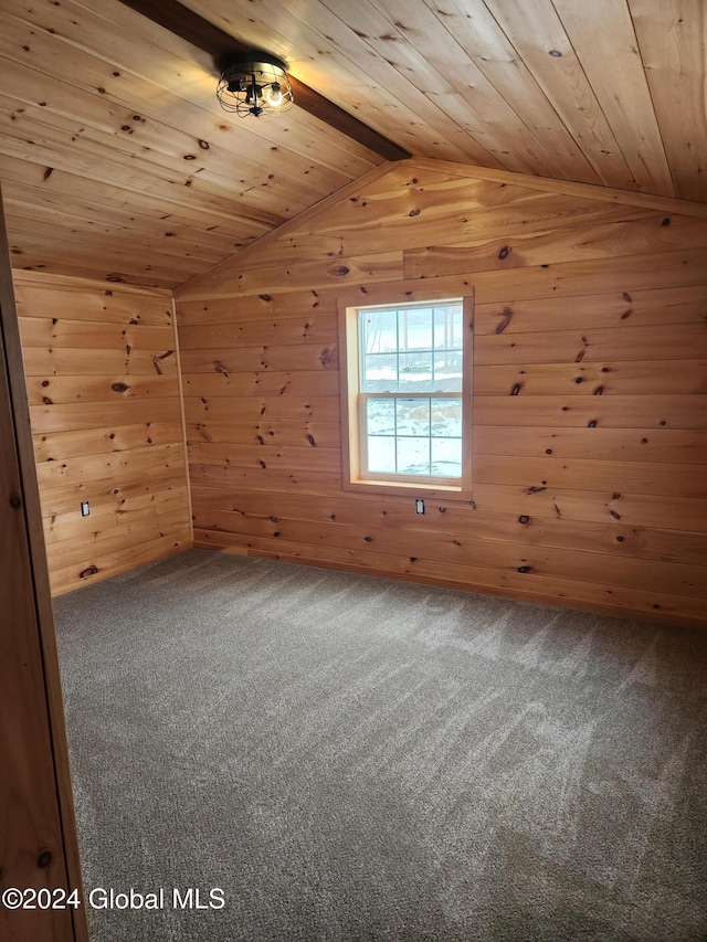 additional living space featuring lofted ceiling, carpet floors, wooden walls, and wooden ceiling