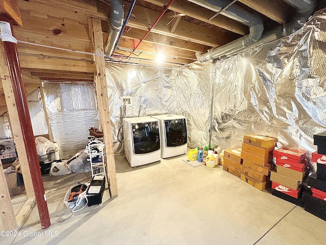 basement with washing machine and dryer