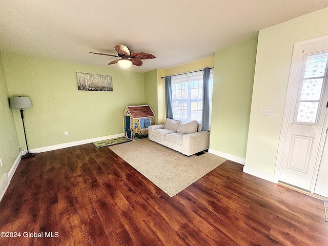 unfurnished room with ceiling fan and hardwood / wood-style flooring