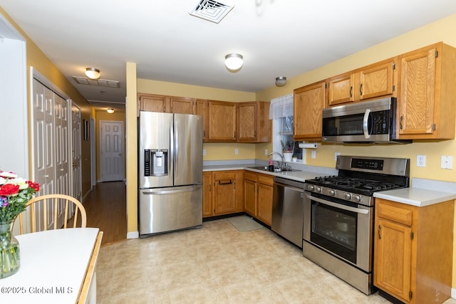 kitchen featuring sink and stainless steel appliances