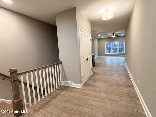 hall with light hardwood / wood-style flooring