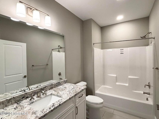 full bathroom with vanity, tile patterned flooring, shower / bathing tub combination, and toilet