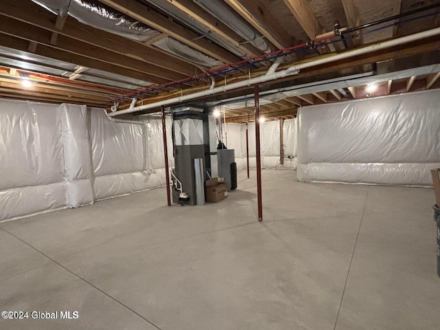 basement featuring water heater