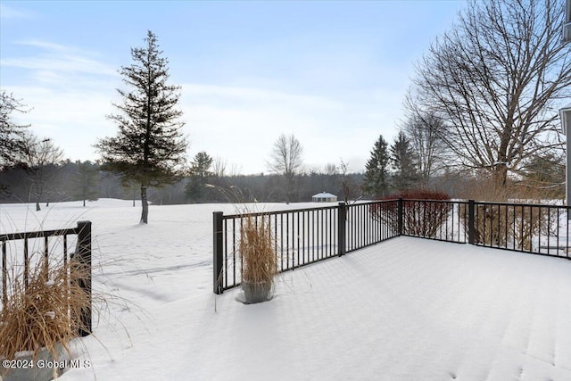 view of snow covered deck