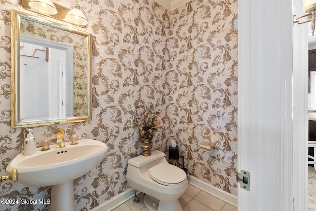 bathroom with tile patterned flooring and toilet