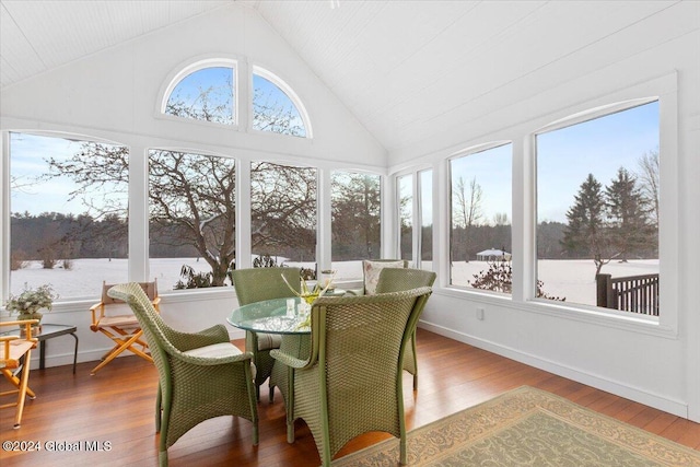 sunroom / solarium with lofted ceiling