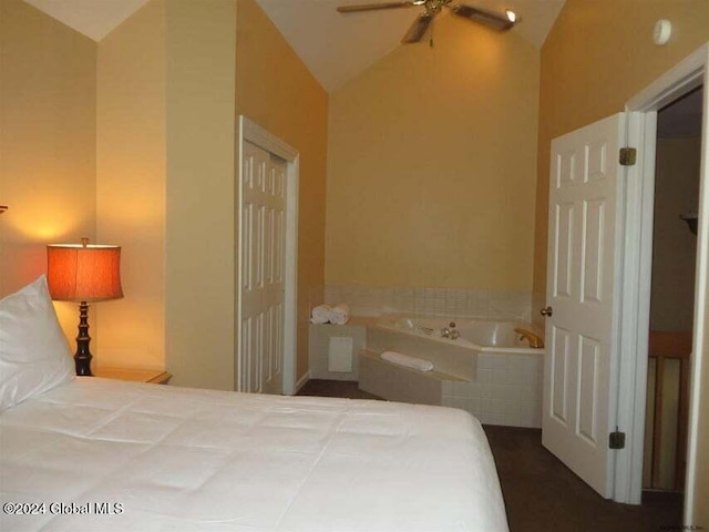 bedroom with vaulted ceiling, a closet, and ceiling fan