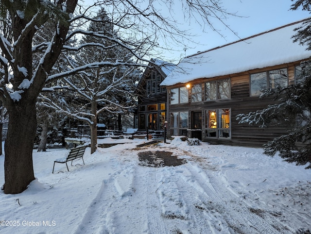 view of snow covered property