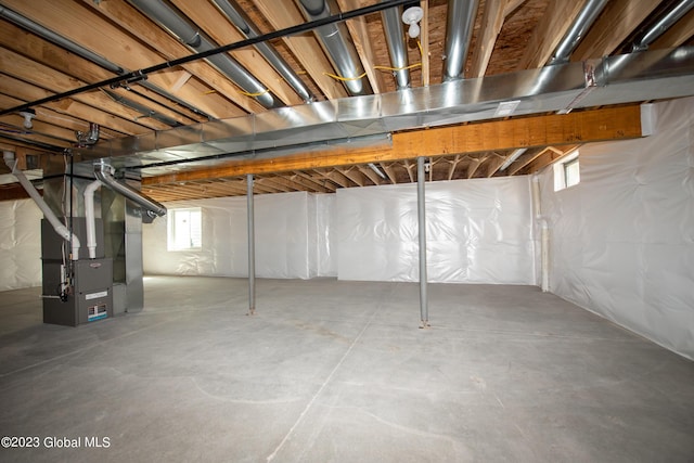 basement featuring heating unit