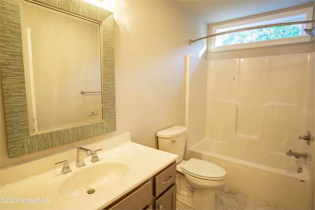 full bathroom featuring vanity,  shower combination, and toilet