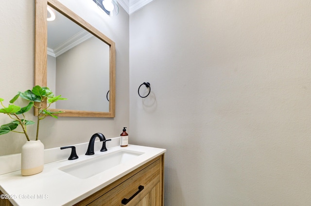 bathroom featuring vanity and crown molding