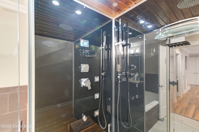 bathroom with hardwood / wood-style floors