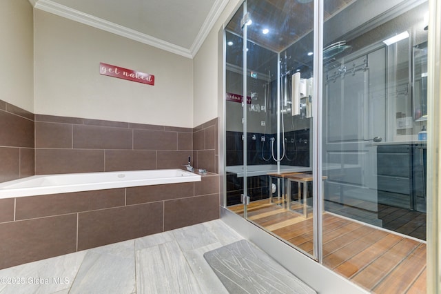 bathroom featuring crown molding and plus walk in shower