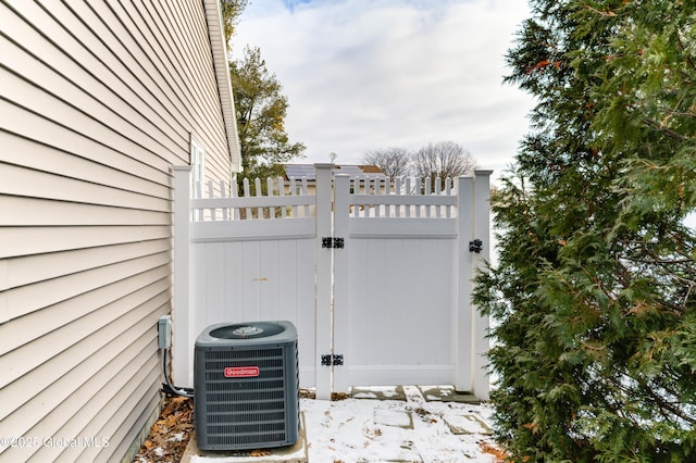 view of gate featuring central AC unit