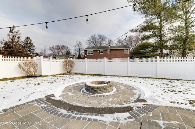 view of patio featuring a fire pit