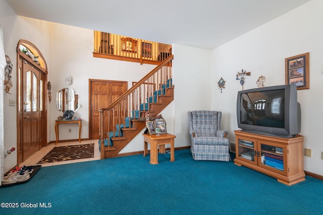 entrance foyer featuring carpet flooring