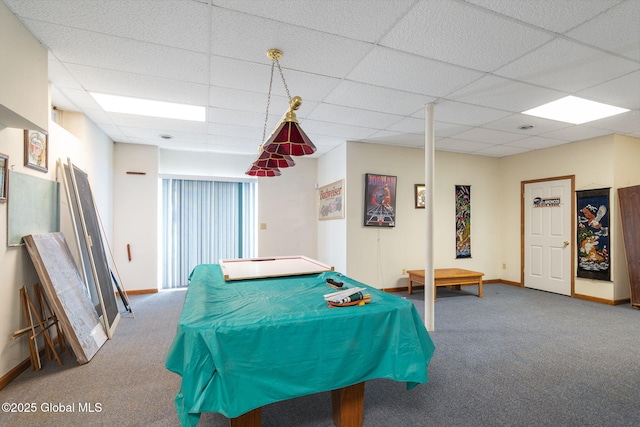 rec room with carpet flooring and a drop ceiling