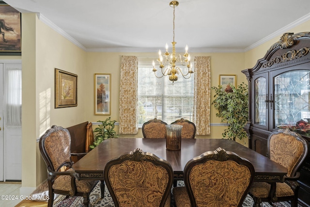 tiled dining area featuring a notable chandelier and ornamental molding