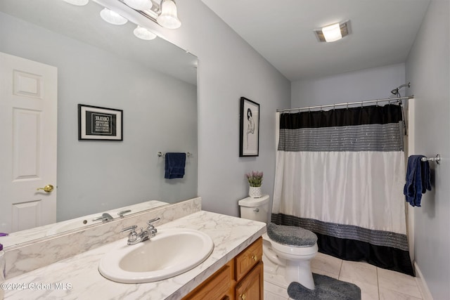 bathroom featuring toilet, tile patterned flooring, vanity, and walk in shower