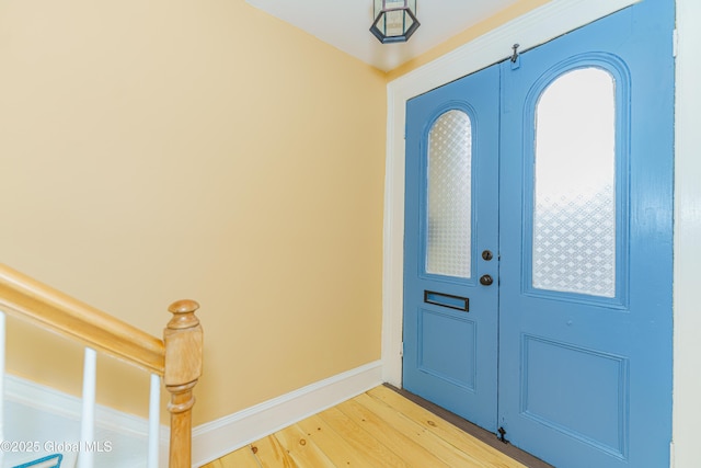 entrance foyer with hardwood / wood-style floors