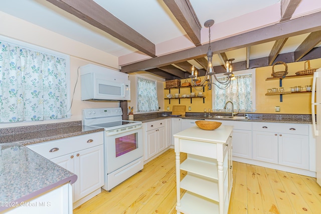 kitchen with beamed ceiling, white appliances, and white cabinetry