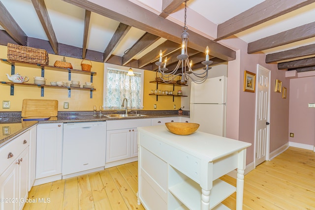 kitchen featuring white cabinetry, sink, hanging light fixtures, white appliances, and light wood-type flooring