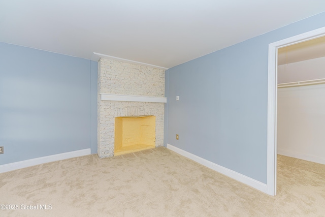 unfurnished living room with light colored carpet