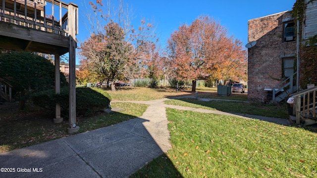 view of yard featuring a deck