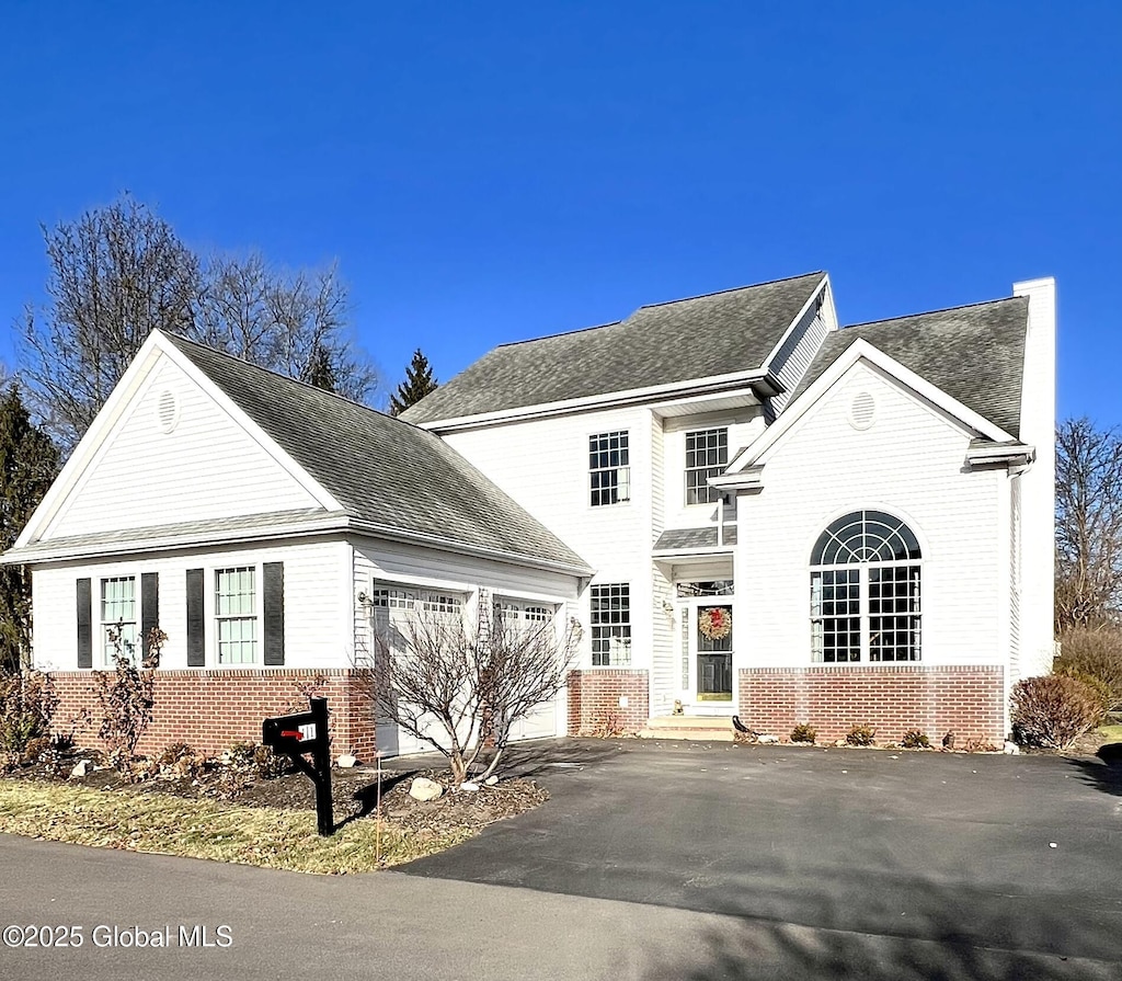 front of property featuring a garage