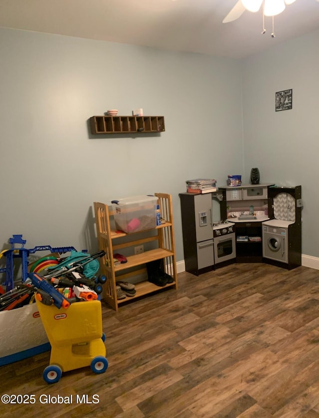 office area featuring ceiling fan and dark hardwood / wood-style flooring