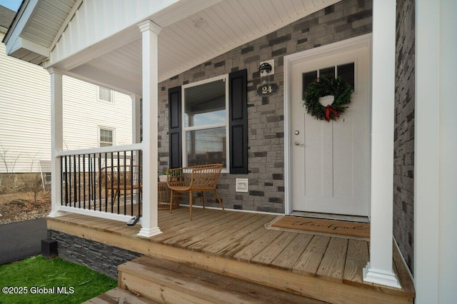 entrance to property with covered porch