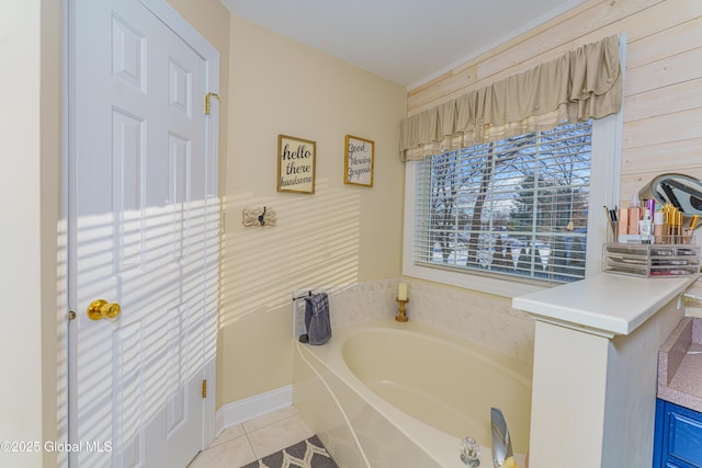 full bathroom featuring tile patterned floors and a bath