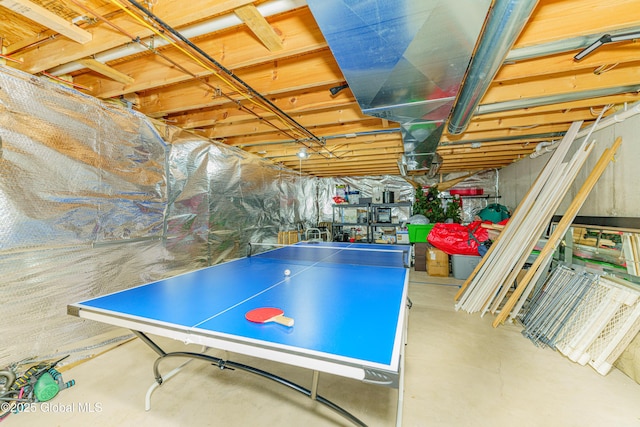 playroom featuring finished concrete flooring